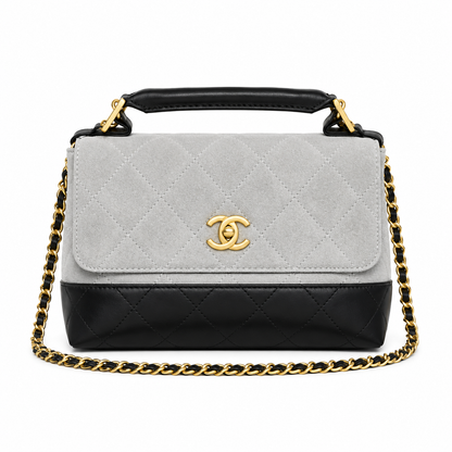 Chanel quilted top handle flap bag