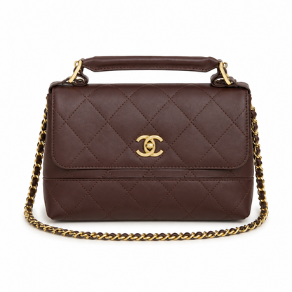 Chanel quilted top handle flap bag
