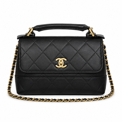 Chanel quilted top handle flap bag