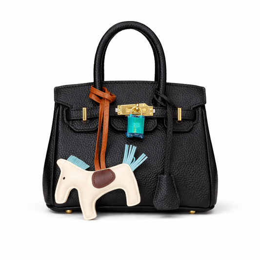 Hermès Birkin bag | a Hermès Rodeo Pegasus PM Milo charm in Kraft (Copy)