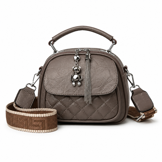 Gray quilted PU dome crossbody bag
